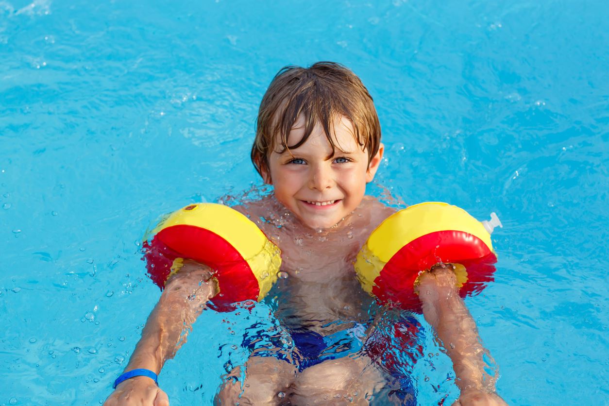 child in swimming pool