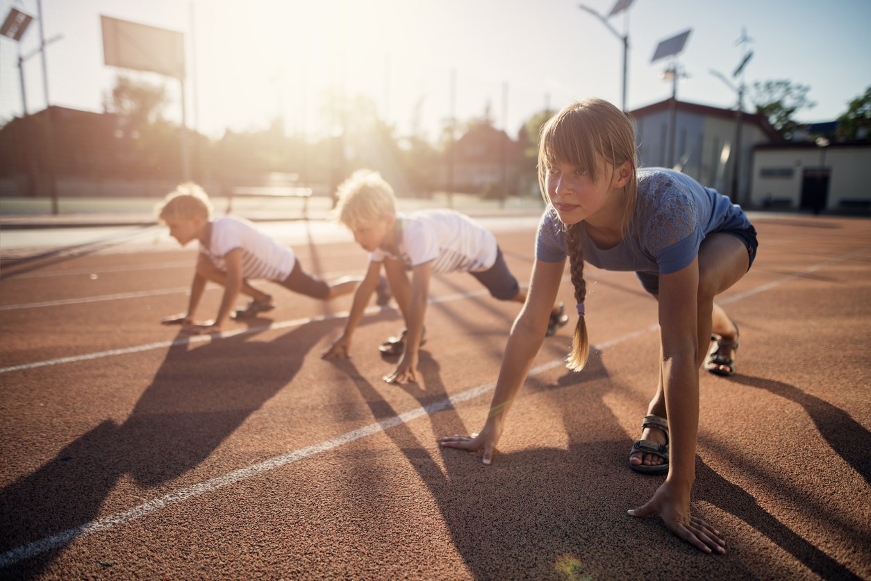 Group of kids training on the track