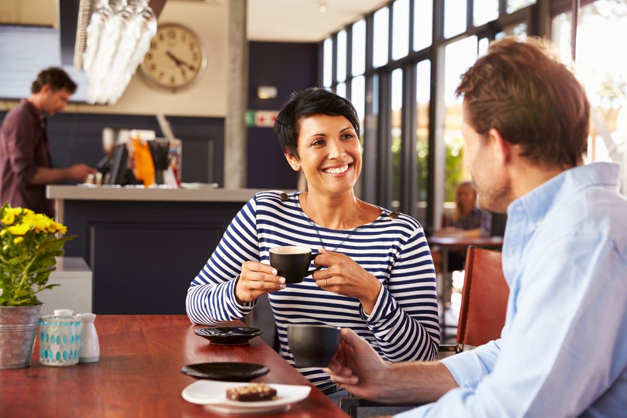 colleagues chatting over a coffee