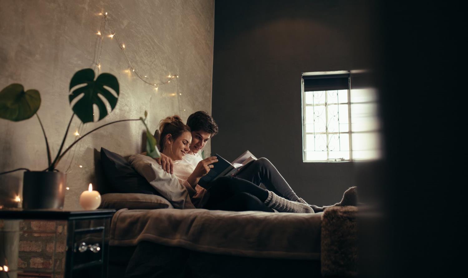 couple reading in bed