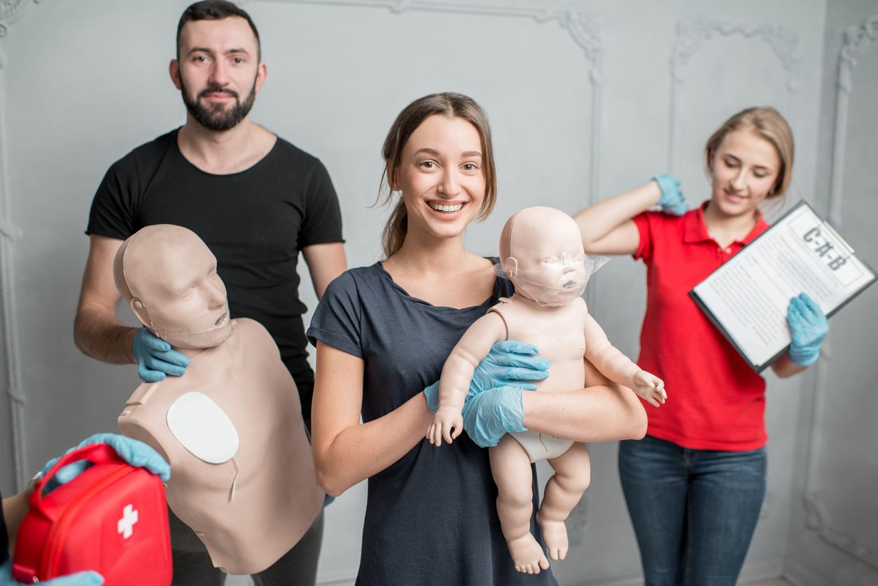 group of people learning first aid