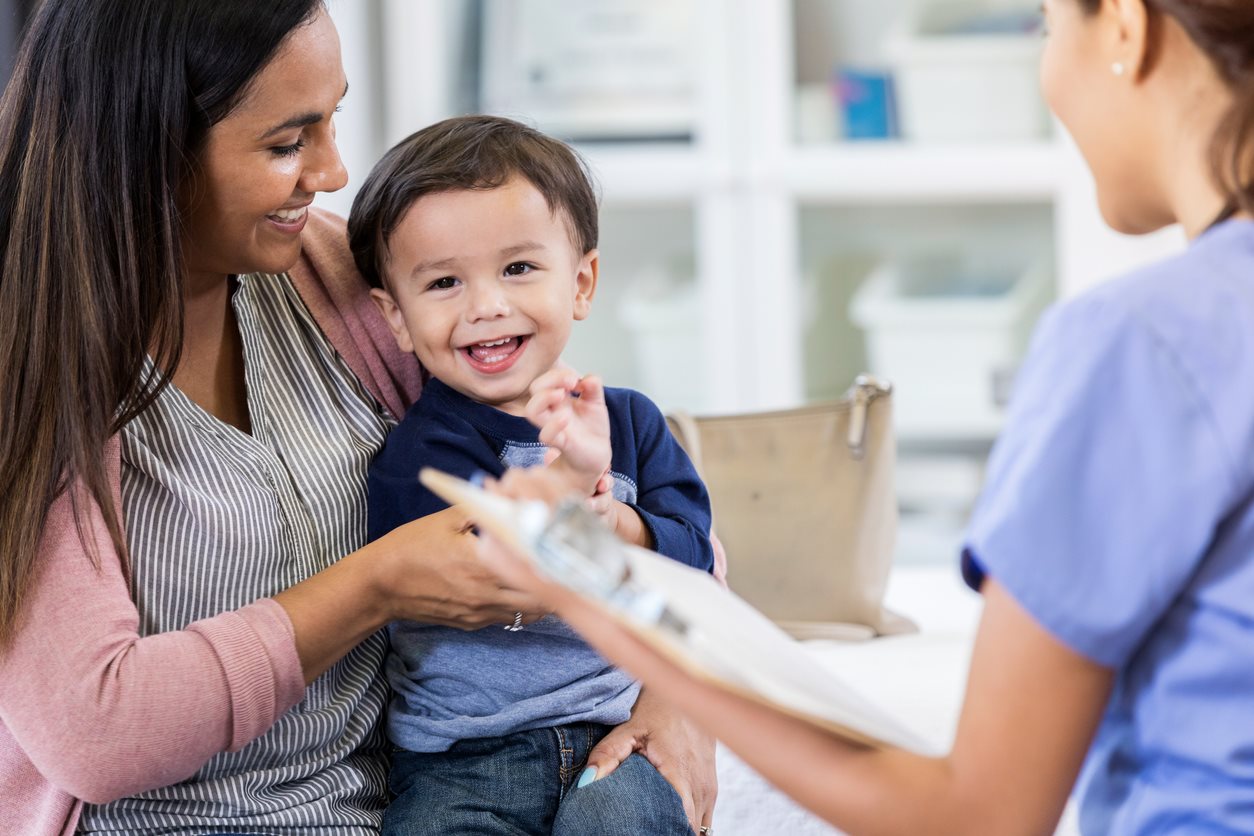 child and parent doctor visit