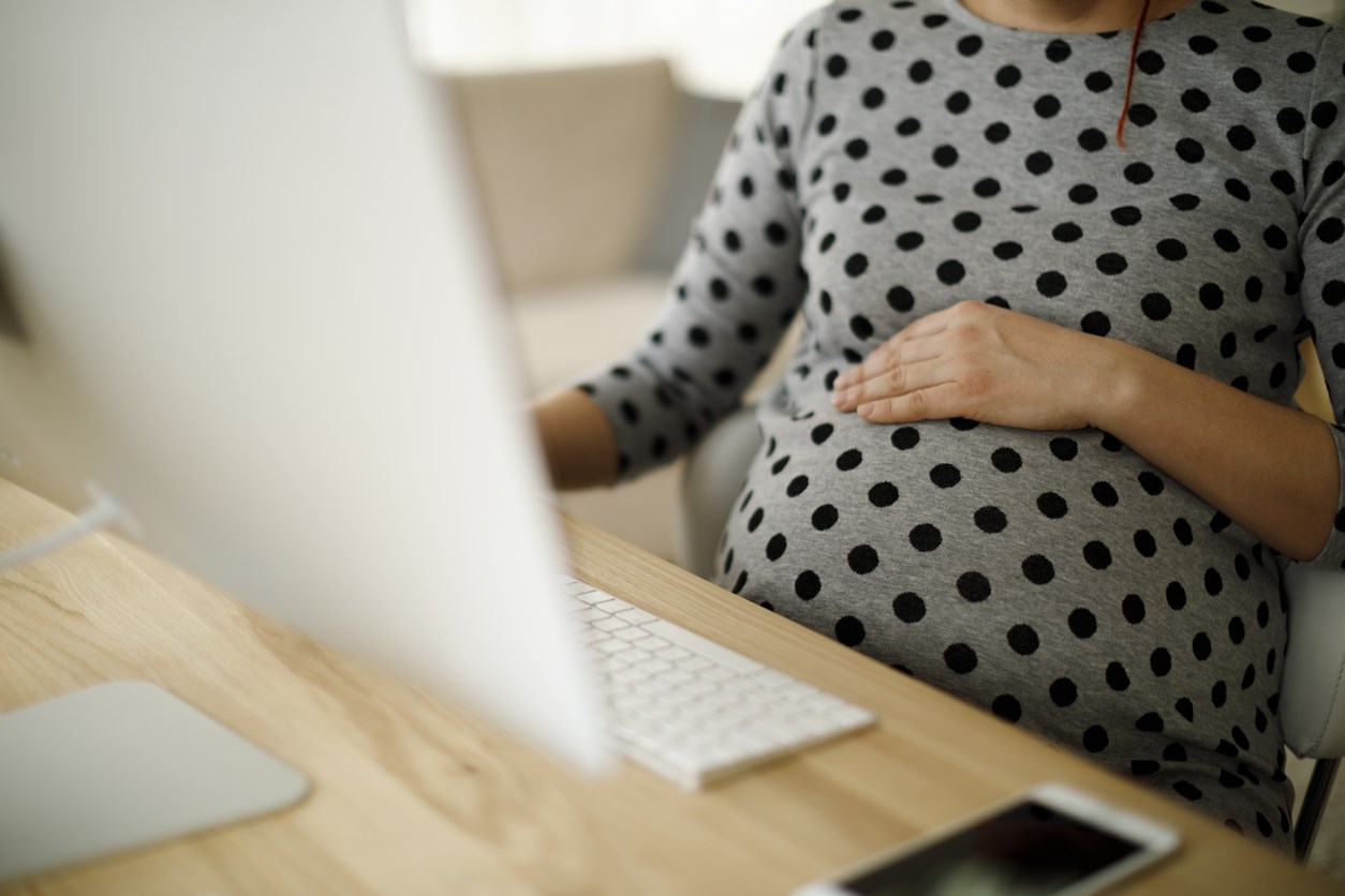 pregnant woman in office