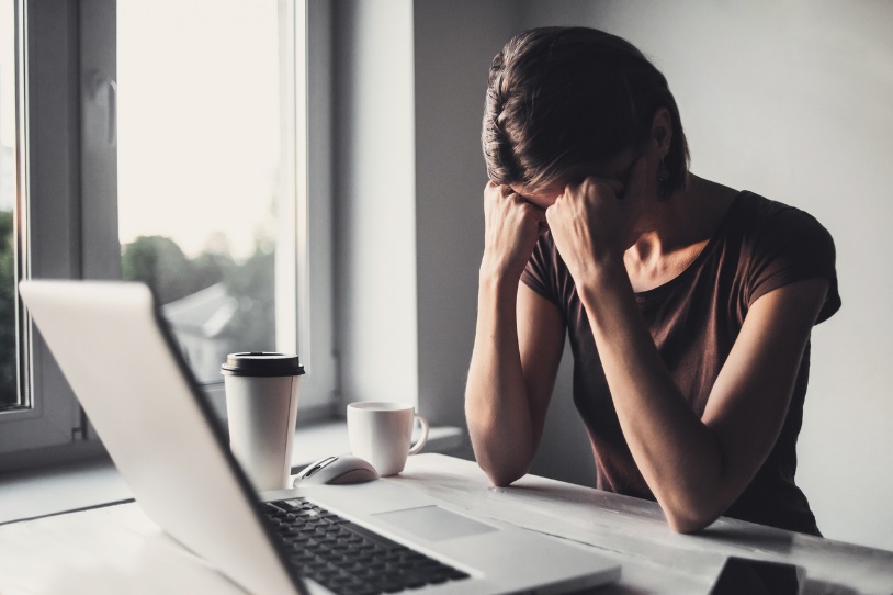 woman stressed at desk