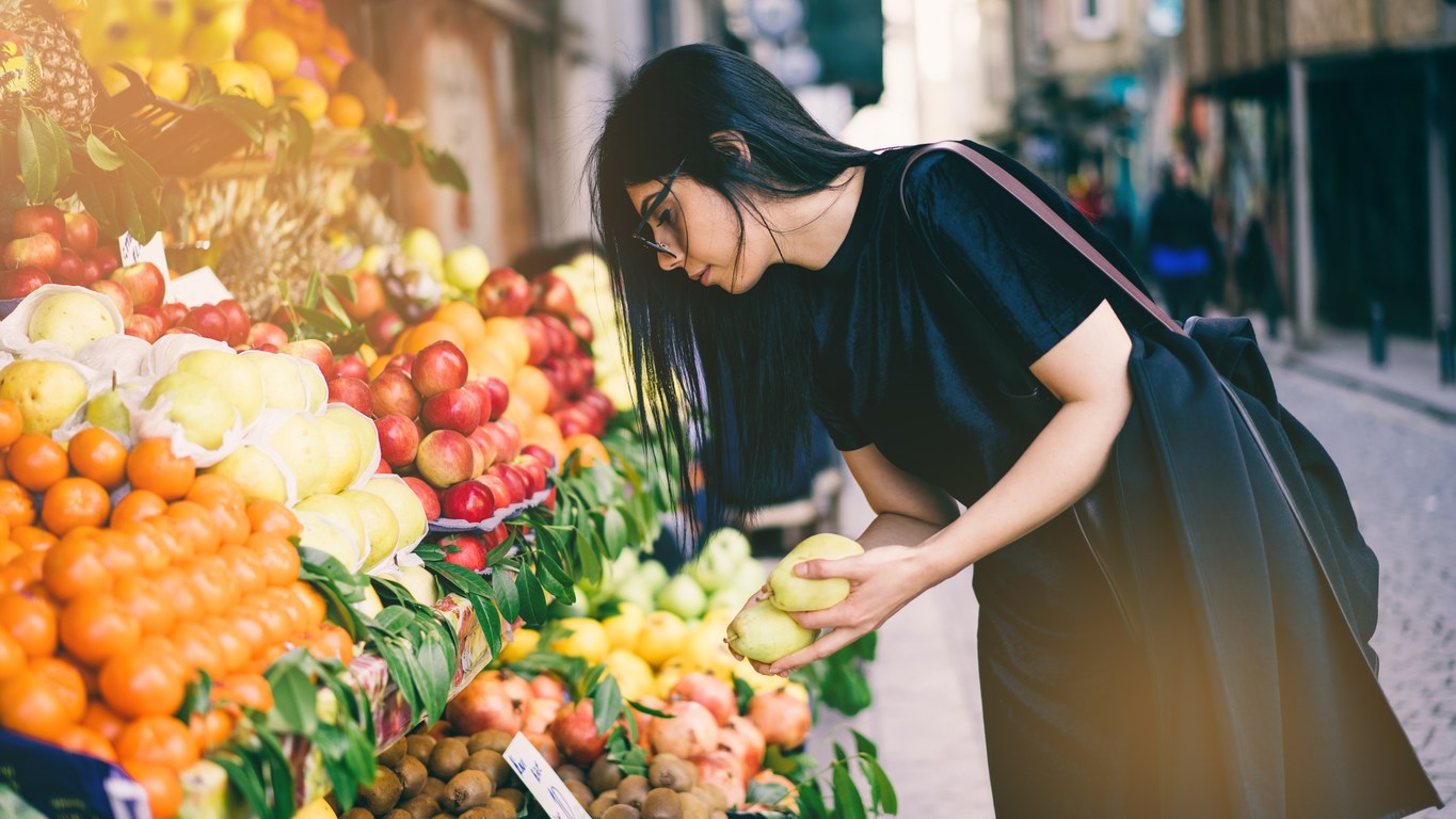 woman shopping for fruit & veg