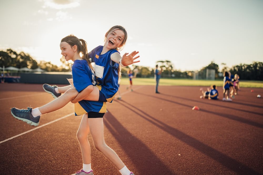 two girls on athletics track