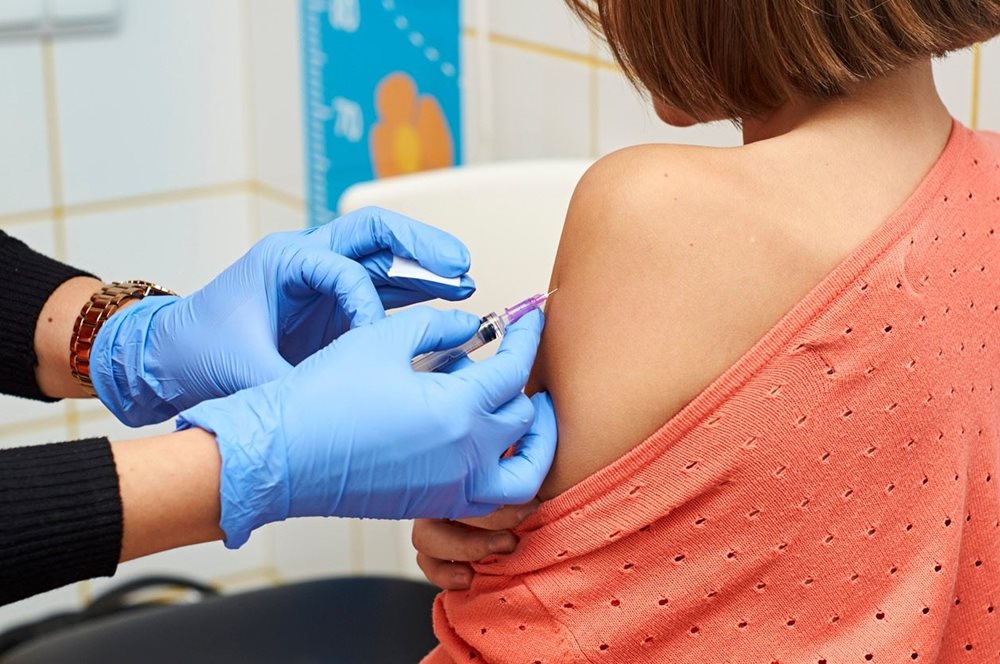 Woman getting HPV vaccine