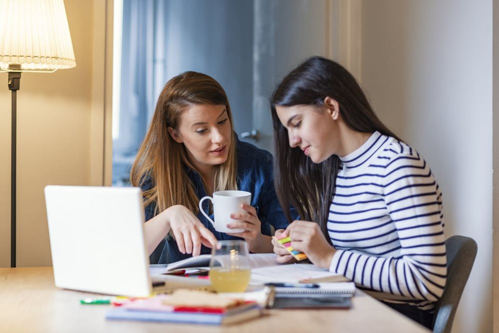 Mother talking to teenage daughter