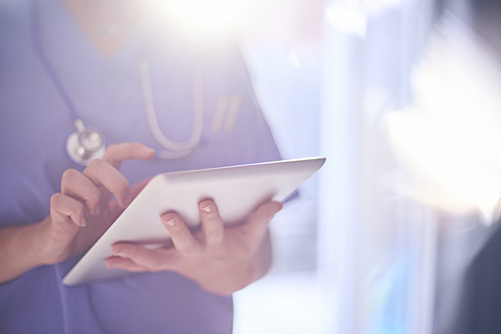 Doctor with clipboard and stethoscope